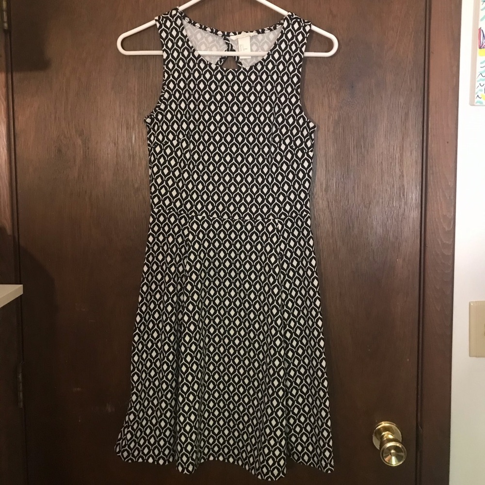 Small black H&M dress with back cut out.